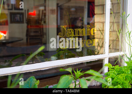 Cambridge Uk, 2019-05-22, Jamie's Italian reastaurant in Cambridge is one of 22 to be closed, All but three of Jamie Oliver’s 25 UK restaurants have closed, with the loss of 1,000 jobs, after the business called in administrators. The lights are left on but the doors are firmly locked, in the windows are printed signs as to who the administrators are for further information Stock Photo