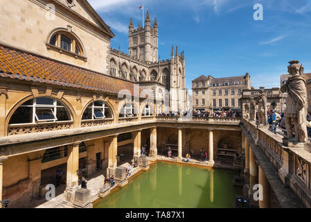 Bath, England - May 13, 2019 : inside of Roman Baths which is a site of historical interest in the city of Bath. The landmark is a well-preserved Roman site for public bathing .