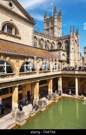 Bath, England - May 13, 2019 : inside of Roman Baths which is a site of historical interest in the city of Bath. The landmark is a well-preserved Roman site for public bathing .