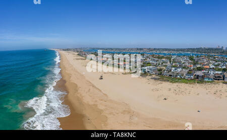 Waves break on the warm California coast. Image captured from an aeiral drone at an altitude of 50 meters Stock Photo
