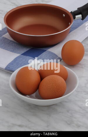 fried eggs or scrambled eggs ingredients on a lovely set up Stock Photo