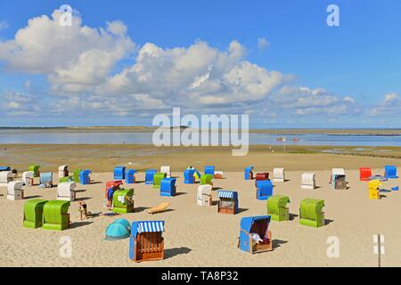 Bathing beach, sandy beach with colourful beach chairs in Utersum, Fohr, North Sea, North Frisian Island, North Frisia, Schleswig-Holstein, Germany Stock Photo