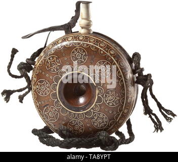 A German bone-inlaid powder flask, circa 1620 Round wooden flask with radial and circular bone inlays on one side, reverse side 9-fold segmented and inlaid and engraved with various animals in bone. Two lateral strap lugs. Spout and spring-mounted closure replaced. Diameter 10 cm. historic, historical, powder flask, accessory, accessories, military, militaria, object, objects, stills, utilities, utility, clipping, clippings, cut out, cut-out, cut-outs, utensil, piece of equipment, utensils, 17th century, Additional-Rights-Clearance-Info-Not-Available Stock Photo