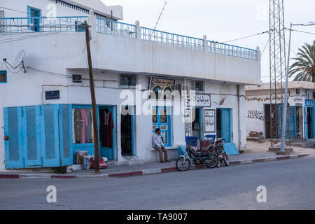 SOUSSE, TUNISIA, AFRICA-CIRCA MAY, 2012: Local patisserie with parked mopeds. It is a shop where French pastries and cakes are sold. Backstreets of Tu Stock Photo