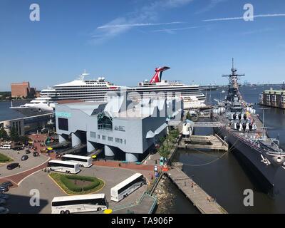 The Carnival Sunrise (formerly Carnival Triumph) cruise ship docked at the Decker Half Moone Cruise and Celebration Center located next to the Hampton Roads Naval Museum; which shares the campus with Nauticus in Norfolk ,Virginia. The cruise ship has scheduled port visits to Norfolk, New York City, and Fort Lauderdale, Florida during its 2019 cruising season.  (US Navy Photo by Max Lonzanida/Released). Stock Photo