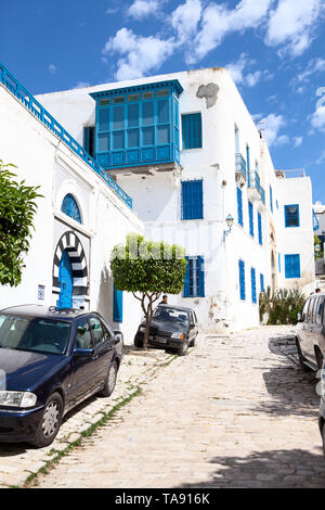 SIDI BOU SAID, TUNISIA, AFRICA-CIRCA MAY, 2012: Beautiful and narrow streets of town in central part. Town itself is tourist attraction and is known f Stock Photo