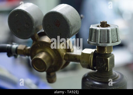 Close-up of a pressure sensors on an oxygen cylinder with inscriptions in Russian Stock Photo