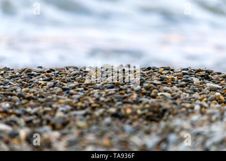 Small blue-gray stone background, natural stone pattern.selective focus. Stock Photo