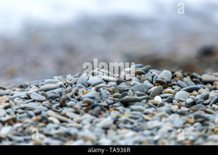 Small blue-gray stone background, natural stone pattern.selective focus. Stock Photo