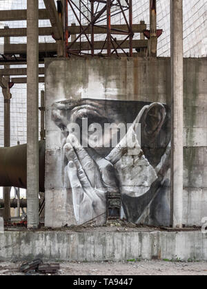 Drawing graffiti inside Chernobyl Exclusion Zone Stock Photo