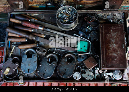 Key makers tools and old locks on store, Pune, Maharashtra. Stock Photo