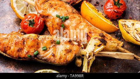 Barbecue skewers with fish.Grill salmon shish kebab Stock Photo