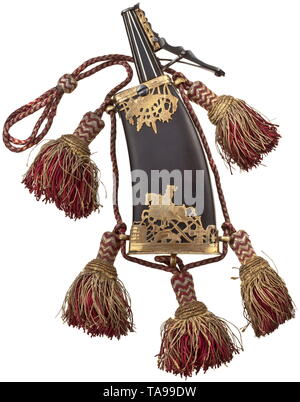 A German luxury powder flask, circa 1620 Ebony body and chute with finely inlaid white bone trim lines. Fire-gilded, open-worked brass mounting. On front side portrayal of a mounted soldier with sword in between trophy décor. On reverse side iron carrying clasp with open-worked sheet brass. Five strap lugs with original red, carrying strap interwoven with gold, and five attached tassels. Length 23 cm. historic, historical, powder flask, accessory, accessories, military, militaria, object, objects, stills, utilities, utility, clipping, clippings, , Additional-Rights-Clearance-Info-Not-Available Stock Photo