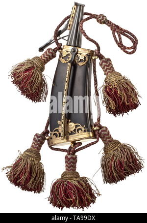 A German luxury powder flask, circa 1620 Ebony body and chute with finely inlaid white bone trim lines. Fire-gilded, open-worked brass mounting. On front side portrayal of a mounted soldier with sword in between trophy décor. On reverse side iron carrying clasp with open-worked sheet brass. Five strap lugs with original red, carrying strap interwoven with gold, and five attached tassels. Length 23 cm. historic, historical, powder flask, accessory, accessories, military, militaria, object, objects, stills, utilities, utility, clipping, clippings, , Additional-Rights-Clearance-Info-Not-Available Stock Photo