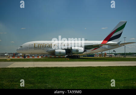 Emirates airlines, Airbus A380 aircraft arriving at Gatwick Airport. Large double decker aircraft.