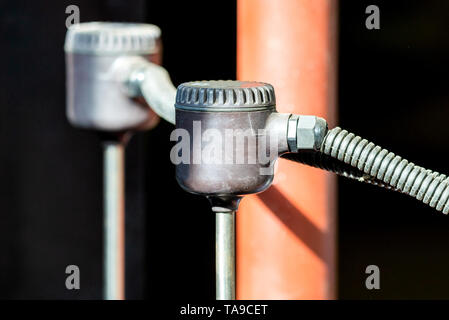 Electrical chlorine meter measuring chlorine in pipe water. Stock Photo
