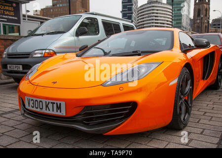 Liverpool, Merseyside. 23rd May, 2019 UK Weather: Fine, sunny sailing condition as up to 200 motorcyclists and tens of supercars including a 2011 Orange Mclaren, queue to board the ferry to the Isle of Man to attend the island TT races.  Extra ferry services are to be added to cope with the large demand for spectators travelling to attend this year’s top motor sport week of qualifying events of the fastest road race on the planet. Credit: MediaWorldImages/AlamyLiveNews Stock Photo