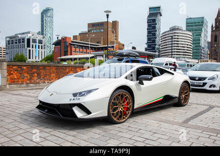 Liverpool, Merseyside. 23rd May, 2019 UK Weather: Fine, sunny sailing condition as up to 200 motorcyclists and tens of supercars including a Lamborghini Huracan Performante Lp640 queue to board the ferry to the Isle of Man to attend the island TT races.  Extra ferry services are to be added to cope with the large demand for spectators travelling to attend this year’s top motor sport week of qualifying events of the fastest road race on the planet. Credit: MediaWorldImages/AlamyLiveNews Stock Photo