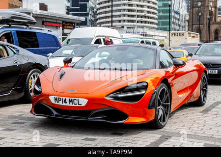 Liverpool, Merseyside. 23rd May, 2019 UK Weather: Fine, sunny sailing condition as up to 200 motorcyclists and tens of supercars INCLUDING A Mclaren 720S V8 S-A, queue to board the ferry to the Isle of Man to attend the island TT races.  Extra ferry services are to be added to cope with the large demand for spectators travelling to attend this year’s top motor sport week of qualifying events of the fastest road race on the planet. Credit: MediaWorldImages/AlamyLiveNews Stock Photo