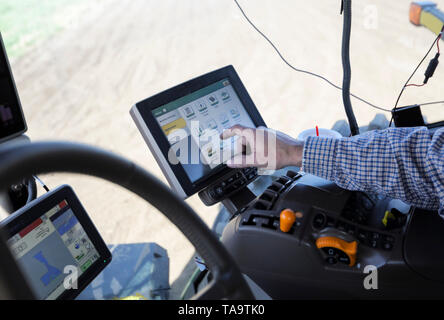 (190523) -- IOWA, May 23, 2019 (Xinhua) -- Bill Pellett's son Bret operates a planter machine at their family farm in Atlantic of Cass county, Iowa, the United States, April 24, 2019. Bill Pellett knows how to farm, but just like most of his peers across the country, the 71-year-old farmer is feeling less assured of what he could get from a new year of farming, as there appears to be no quick resolution of the year-long trade disputes between the United States and China.   TO GO WITH 'Spotlight: Leading U.S. farming state enters new crop season amid uncertainty over trade prospects with China' Stock Photo