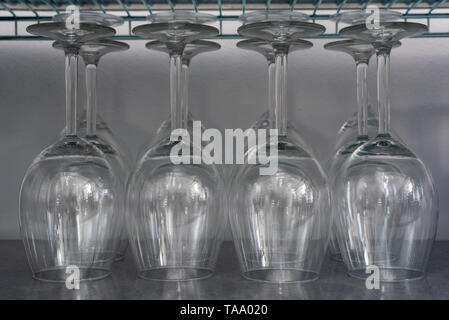 Rows of empty wine glasses close-up view Stock Photo
