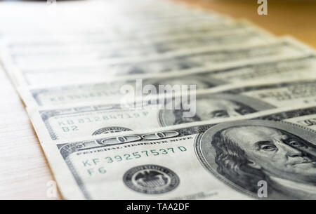 Fan of hundred dollar bills, close up Stock Photo