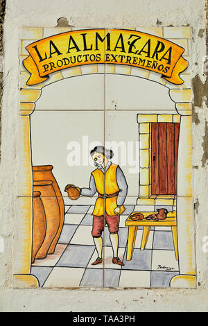 Ceramic tiles on the wall of a traditional shop, Plaza Mayor. Trujillo. Spain Stock Photo