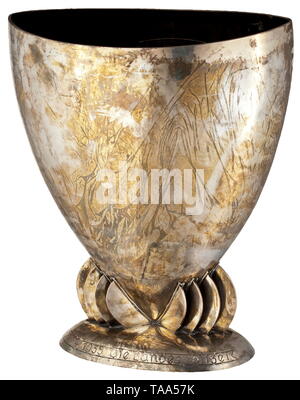 Hermann Göring - Emmy Sonnemann, a wedding present of the Prussian police force 1935 Large, hand-hammered silver vase with engraved emblem of the Prussian police with banner (tr.) 'God with us!' and the dedication inscription (tr.) 'To our General Göring - 10 April 1935 the Prussian Police'. Master mark 'HJ Wilm Berlin', master monogram 'FR', on the base the company mark 'H.J. Wilm Berlin', (tr.) 'hand beaten' and '925', height 38 cm, width 33 cm, weight 3600 g. Provenance: Keith Wilson Collection, Kansas City. Göring's wedding with the famous actress Emmy Sonnemann was one, Editorial-Use-Only Stock Photo