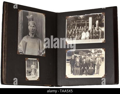 Four photo albums of an embassy or military member Partly inscribed albums with approx. 390 photographs, timeframe 1920s - 30s. Shown are soldiers, portrays and groups with uniform and decoration details. Transport of troops on river, aerial views of barracks, cavalry steeplechase, practice firing, encampments, sleeping quarters, mustering and parades etc. Mainly military but also civilian photographs. Furthermore roads, factories, events, landscapes, freighters 'Kobe Maru' and 'Kamo'. Two albums with Japanese inscriptions, leather and linen cove, Additional-Rights-Clearance-Info-Not-Available Stock Photo