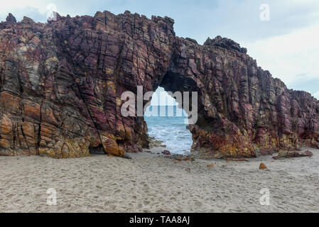 The natural arch on the beach of Jericoacoara in Brazil Stock Photo