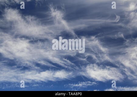 Fine formations of high cirrus spissatus clouds . Stock Photo
