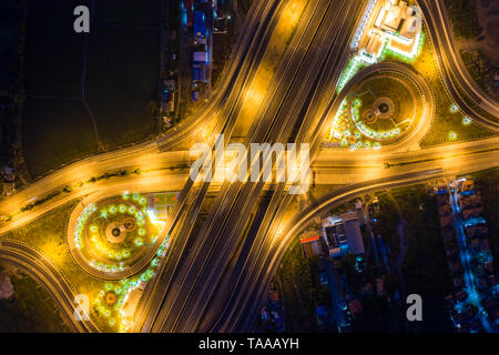 Aerial view of highway junctions. Bridge roads shape number 8 or infinity sign in structure of architecture concept. Top view. Urban city, Bangkok at 