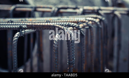 Dowel bar reinforcement concrete footing construction in process preparation industry abstract teamwork business. Stock Photo