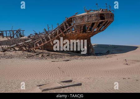 The shipwreck, Eduard Bohlen lies about 500 meters inland today after stranded in 1909 south of Conception Bay, Namibian coast. Stock Photo