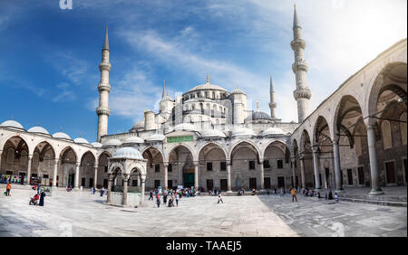 ISTANBUL, TURKEY - MAY 28, 2016: Tourists visit Blue Mosque in Istanbul. It was built from 1609 to 1616, during the rule of Sultan Ahmed Stock Photo