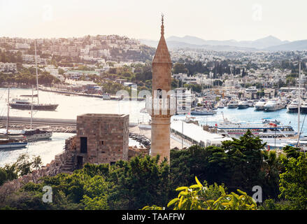 Mosque with tower at Bodrum Castle museum and view to harbor in Turkey Stock Photo