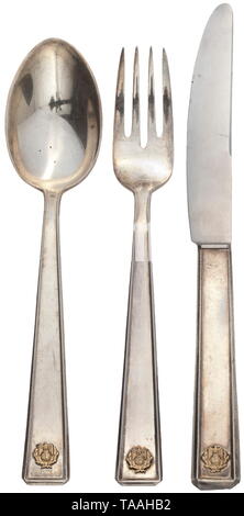 Joachim von Ribbentropp (1893 - 1946), Reich Minister for Foreign Affairs - a three-piece cutlery set from the ministry Pieces of silver cutlery, stamped with crown, crescent and '900'. Applied symbol of the Foreign Office, national eagle with swastika above globe. Knife with iron blade, length 21.3 cm, spoon and fork 18.5 cm each. Slight traces of age and usage. Rare. historic, historical, 20th century, 1930s, NS, National Socialism, Nazism, Third Reich, German Reich, Germany, German, National Socialist, Nazi, Nazi period, fascism, Editorial-Use-Only Stock Photo