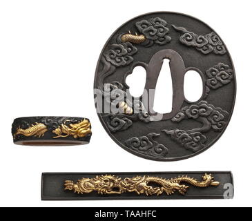 Mountings for a Japanese daisho, late Edo period and later Nigurome tsuba daisho in Edo kinko style with the relief of a dragon between clouds, slightly rubbed. Diameter 7.4 and 8 cm. Two shakudo fuchi kashira in Goto style also with dragon on nanako ground, one inscribed "Hayashi". Shakudo kozuka and kogai with dragon motif and a pair of en suite worked cast menuki, also in Goto style. In velvet covered case of dark red leather. Finely crafted set made by various artists. historic, historical, Japanese, Asian, Asia, Far East, object, objects, st, Additional-Rights-Clearance-Info-Not-Available Stock Photo