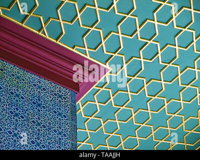 View of classical oriental design, calligraphy pattern art on walls and golden star shaped pattern on roof at Topkapi Palace of istanbul. Stock Photo