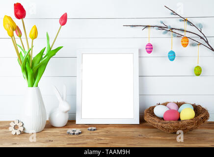 Easter interior decoration background with easter eggs and easter bunny Stock Photo