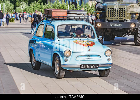 Retro soviet automobile Zaporozhets on the city square at retro cars parade time. Stock Photo