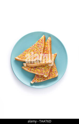 Traditional Australian fairy bread isolated on white background. Top view. Stock Photo