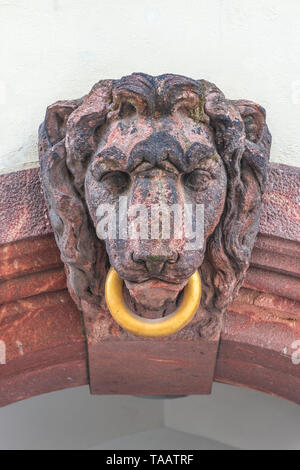 Sculpture of a lion with golden ring in the downtown of Leipzig, Germany, summer, 2015 Stock Photo