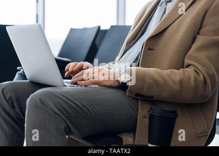 working on laptop, close up of hands of business man. Stock Photo