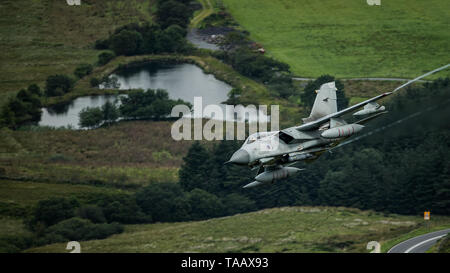 RAF Panavia Tornado GR4 flying low level through the Mach Loop in Wales, UK