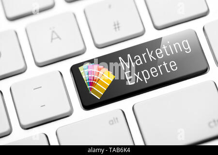 marketing expert key on keyboard Stock Photo