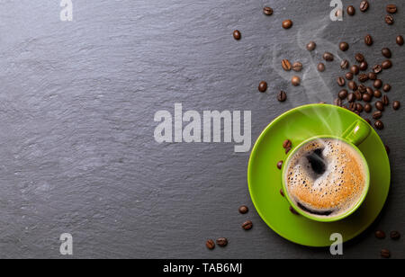 coffee cup background with coffee beans Stock Photo