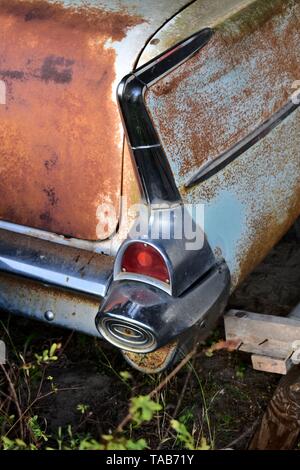 Rusty rear wing of a classic, 1957 Chevrolet Bel Air. Stock Photo