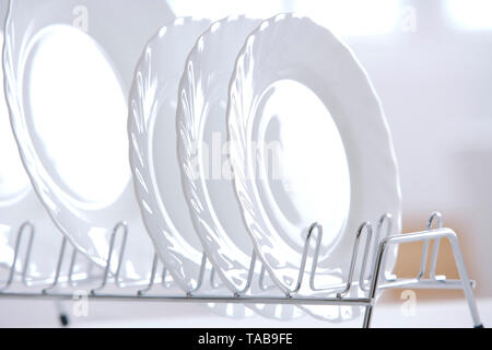 arrangement of plates on the shelf Stock Photo