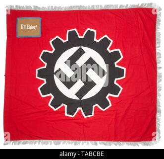 A DAF Orts level flag Double-sided, multi-piece, red cotton construction with applied black swastika and cogwheel on white. Tan wool corner panel with white chain stitched 'Waldorf', edged in light blue tress. Three sides finished with 5 cm silver fringe, hoist edge missing aluminium rings. Approximately 130 x 115 cm. USA-lot, see page 4. historic, historical, 20th century, German Labour Front, German Labor Front, Germany, NS, National Socialism, Nazism, Third Reich, German Reich, organisation, organization, organizations, organisations, object, objects, stills, insignia, s, Editorial-Use-Only Stock Photo